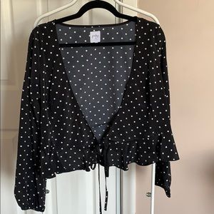 Black polka dot long sleeve top